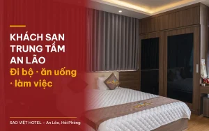 Khách sạn trung tâm An Lão – phòng giường đôi tủ gỗ tối và rèm xám tại Sao Việt Hotel với tiêu đề bài viết